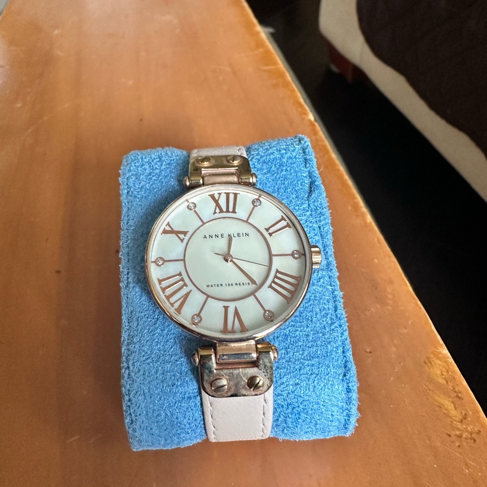 Anne Klein Gold and White Roman Numeral Watch